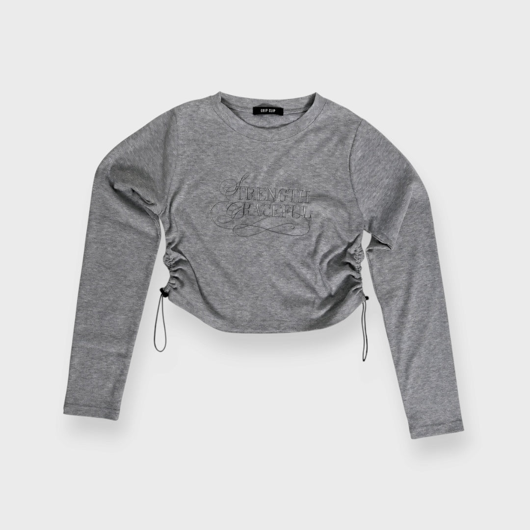 WOMEN’S EMBROIDERED LETTERING SIDE RUCHED LONG SLEEVE CROP TOP GRAY